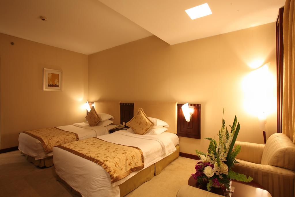 Beijing Wuhuan Hotel Zimmer foto