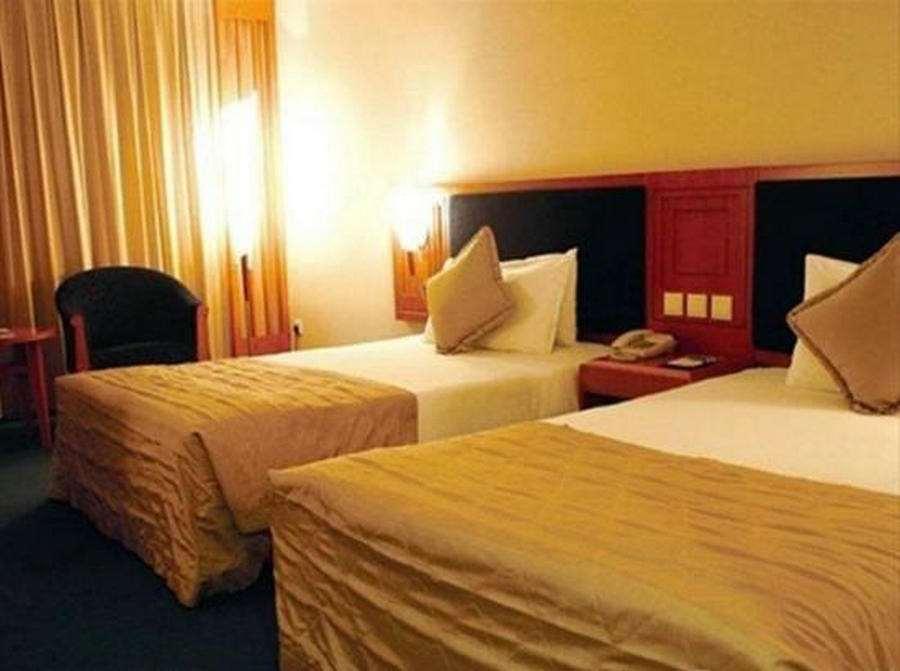 Beijing Wuhuan Hotel Zimmer foto
