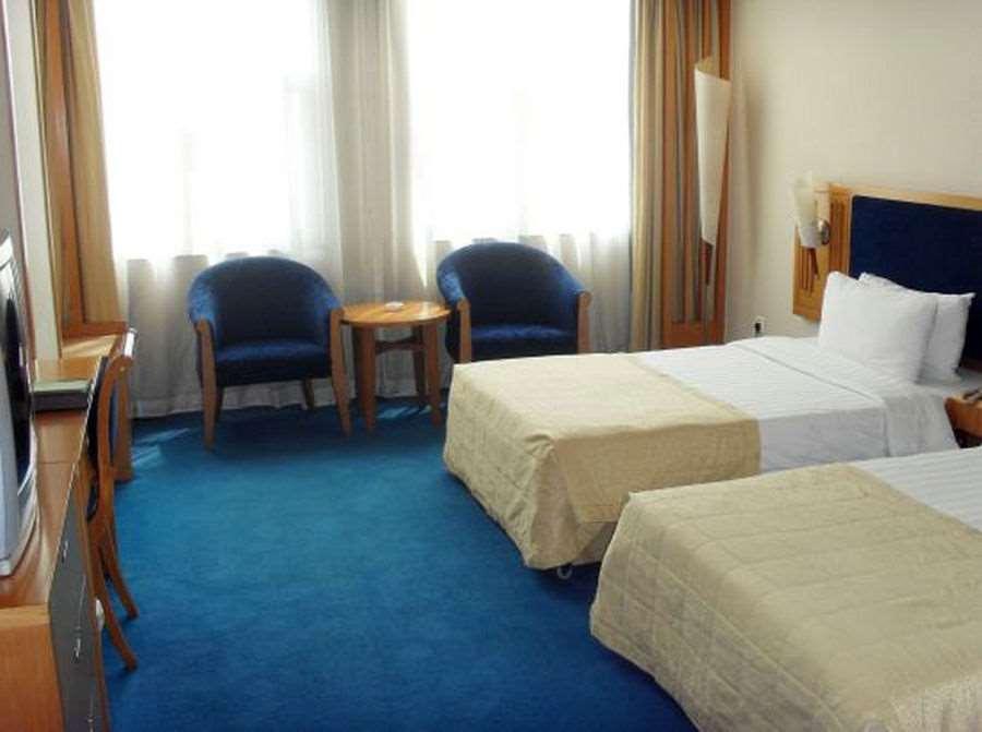 Beijing Wuhuan Hotel Zimmer foto
