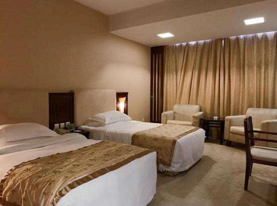 Beijing Wuhuan Hotel Zimmer foto